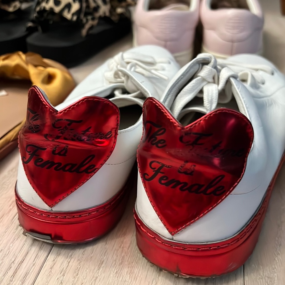 Red metallic accent sneakers